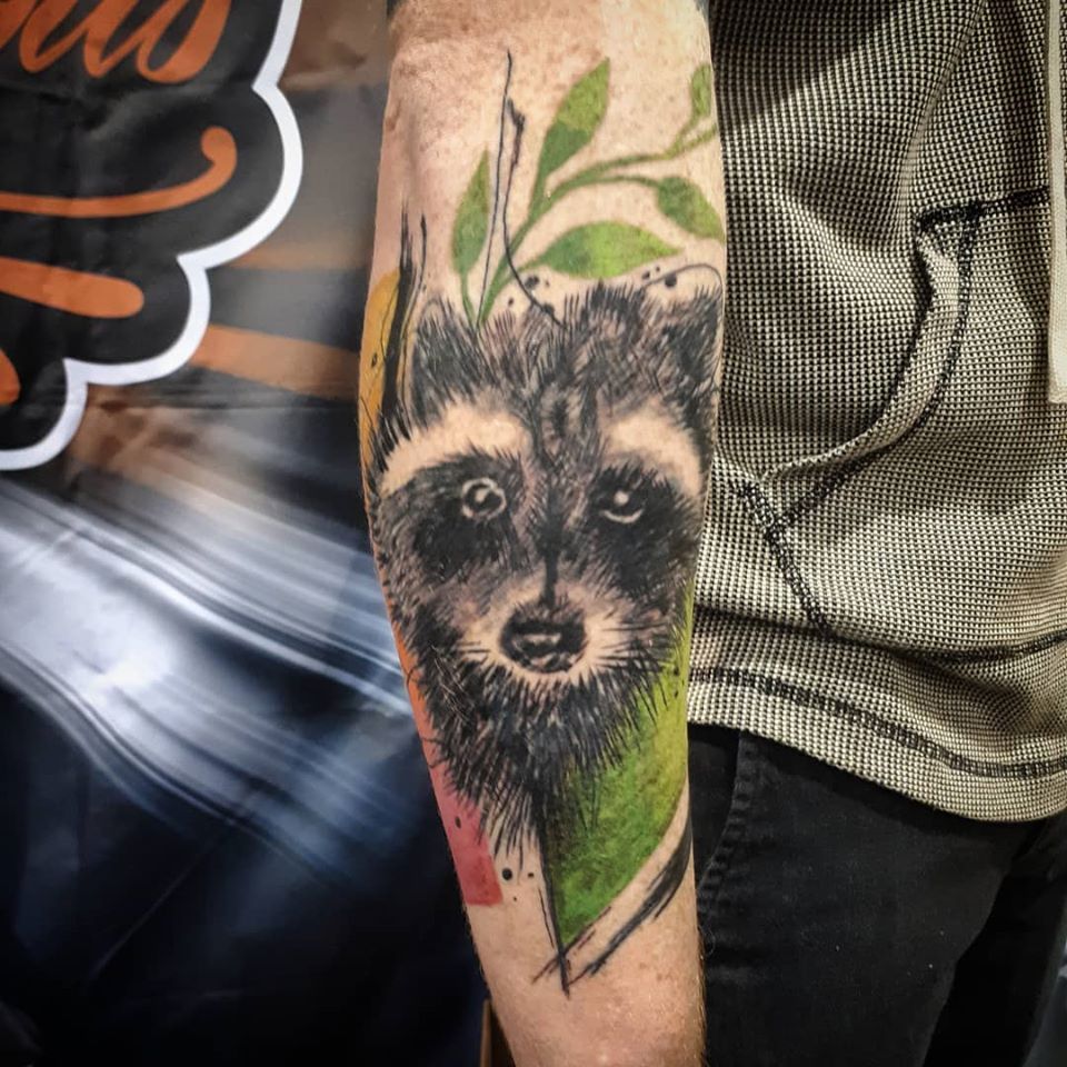 avant garde raccoon tattoo